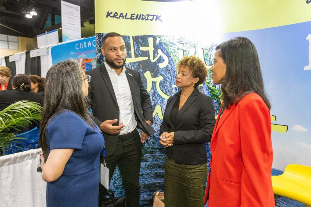 Caribbean Tourism Authority - Memories from Marketplace, Miles Mercera, CEO of the Tourism Corporation of Bonaire, shares his thoughts as CHTA's Vanessa Ledesma and Nicola Madden-Greig look on. Second from right is Veroesjka de Windt, CEO of the Bonaire Hotel and Tourism Association.